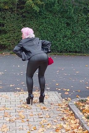 Naughty Granny Tongue Out Flashing Big Tits in Public