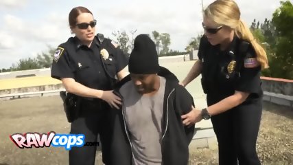 Busty cops taking care of black cock