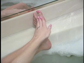 Horny MILF masturbating in the bathroom