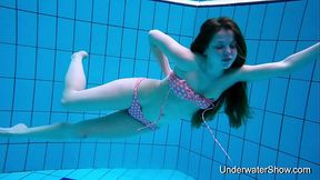 Sexy girl shows magnificent young body underwater