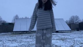 Extreme trembling, shaking from cold on the snow in pajamas