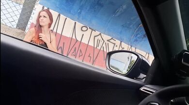 Redhead whore gets fingered in public bus stop blowjob
