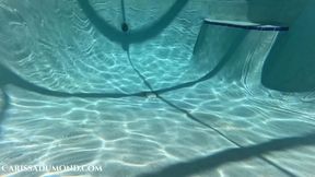 Carissa swimming in the pool in a red open-crotch and open bra lingerie piece
