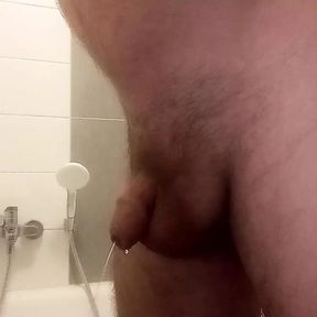 Sweet piss drops from the cock