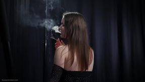 Sultry Brunette Smoking in Fishnets - Teasing Thong Reveal
