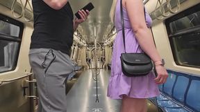Almost Seen by Subway Passengers When She Touch Stranger's Dick Through Pants