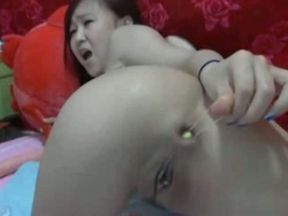 Self fisting of a hot Japanese teen chick on webcam is going well