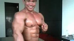 Oiled Bodybuilder Flexing