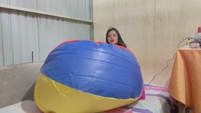 Inflating and deflating big beach ball