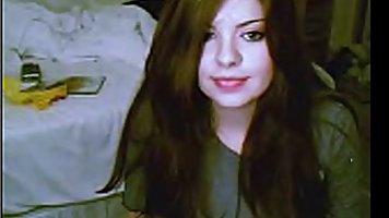 Big tits brunette teen strips on cam