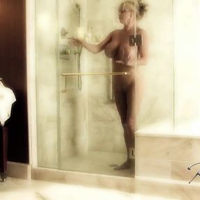 Rachel gets soaking wet in this shower tease