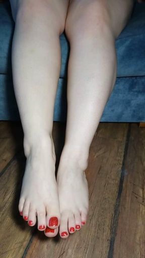 Goddess applies cream to her perfect feet