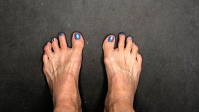 Toe Wiggling With Metallic Blue Toenail Polish