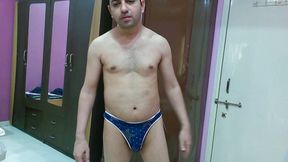 Hot nude boy trying out his new sexy thong.