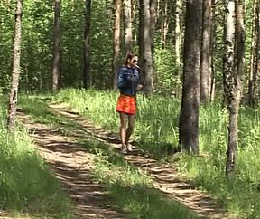 Redhead white teen in sunglasses flashes her pussy and pisses in the woods