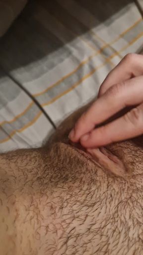 Amateur blonde mixes wet and tight pussy in a solo amateur cumshot