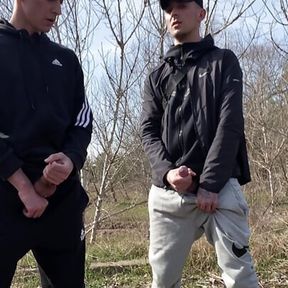 TWO GUYS JERK OFF OUTDOORS