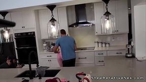 Dude fucks busty stepsister in the kitchen behind the scenes