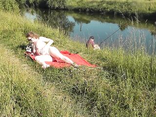 Nudist beach. Hawt mother I'd like to fuck sunbathes in nature's garb out of pants and brassiere is not shy about fisherman. Public