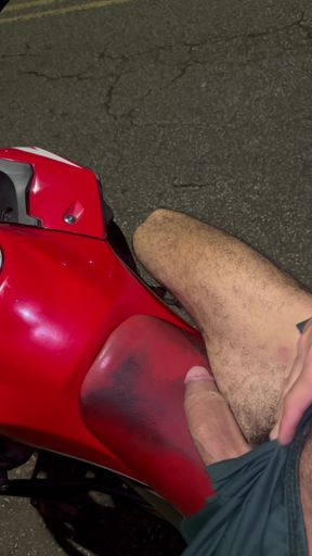 Big, beautiful penis of a Brazilian model on a motorcycle without underwear, showing it off in public.