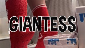 The Dominant Giant on Her Tiny Throne