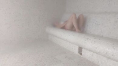 Voyeur has sex with asian girl in public sauna! She masturbates in front of him