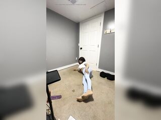 Hot trans CD in Tight blue leggings doing some yoga wit her favorite shirt