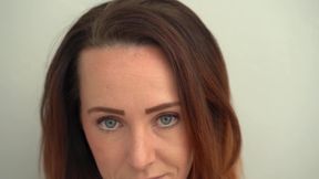 Extreme Close up Blue Eyed Redhead Smoking