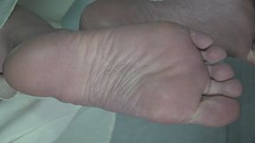 Extreme close up view of Chu Chu's soles