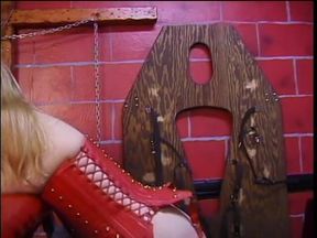 Blonde with huge bruised tits is teased by female temptresses in bondage dungeon