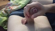 My friend gently massaged my dick, gave me a handjob, and I cumshot