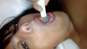 Hot Asian bitch with a popsicle was showing off her body
