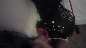 Laura is hogtied in latex catsuite and high heels, throated with a lip open mouth gag POV