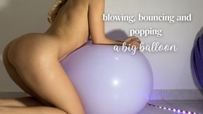 blowing, bouncing and popping a big balloon