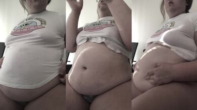 Fatty chugs while playing with her bloated belly button