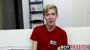 Twink laying alone and stroking cock before using toy