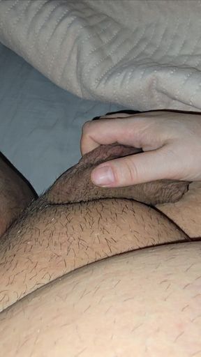 Step mom use her nails to scratch step son ball before handjob his dick