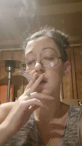 Intense smoking Brunette with Glasses