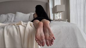 My pretty soles in this position on bed, sole scrunching and toe wiggling