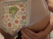Diaper boy rides K9 dildo in a goodnights diaper