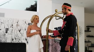 Bellhop fucks a beautiful blonde guest in her slick cunt