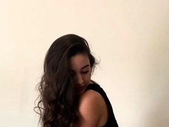 Sexy brunette babe in lingerie and stockings toys pussy