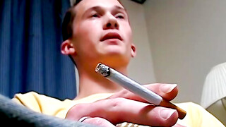 Hottie Braden Spence smokes reds while jerking and end it with a massive load of cum