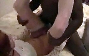 Redhead tgirl gets black cock in her ass