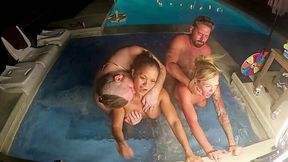 Busty blonde older woman and her friend go wild in a hot tub foursome