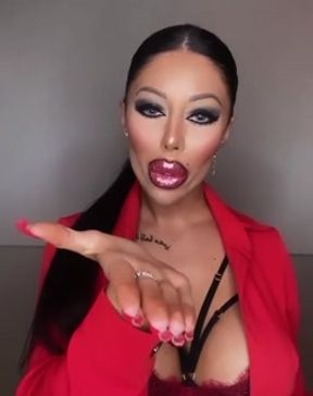 Hot babe Lara Frost in red