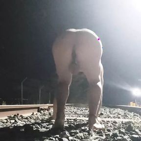 Naked and Pissing on the Train Tracks