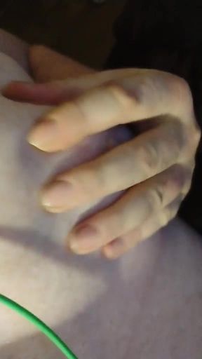Caressing my tits.