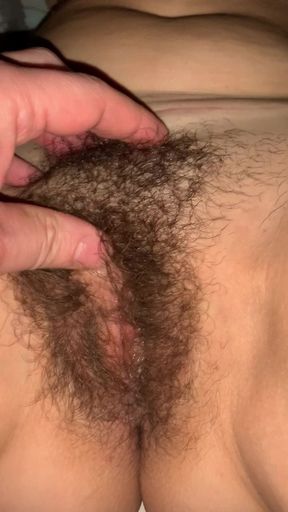 Fingering hairy pussy