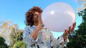 Sunlit Blow-to-Pop: Glitter Balloons in Nature